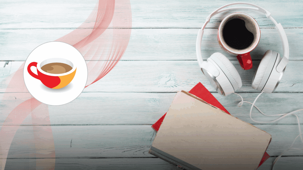 A cozy flat lay featuring a red coffee mug filled with black coffee, a pair of white over-ear headphones, and two books