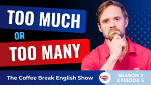 A man in a red shirt with a thoughtful expression, resting his chin on his hand.