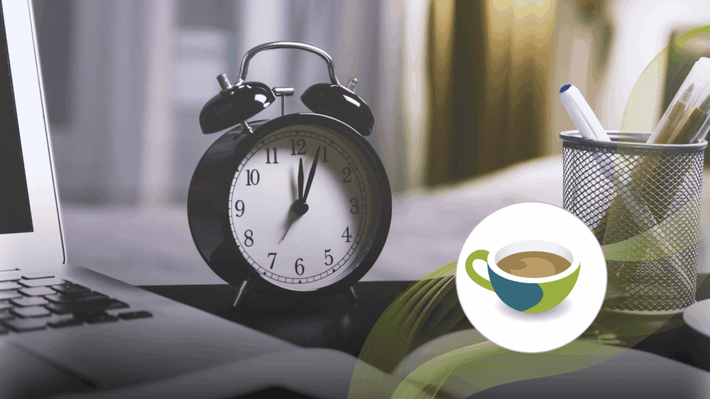 Small table clock on top of a table.