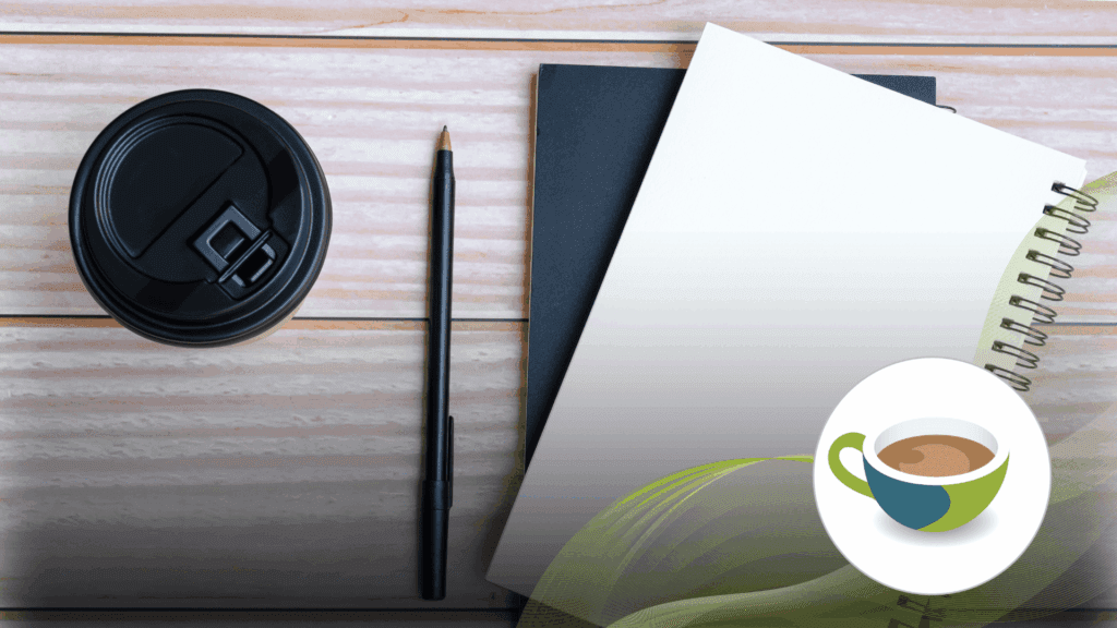 Flat lay of a takeaway coffee cup with a black lid, a black pen, and a stack of notebooks—one spiral-bound with a blank white cover on a light wooden surface.